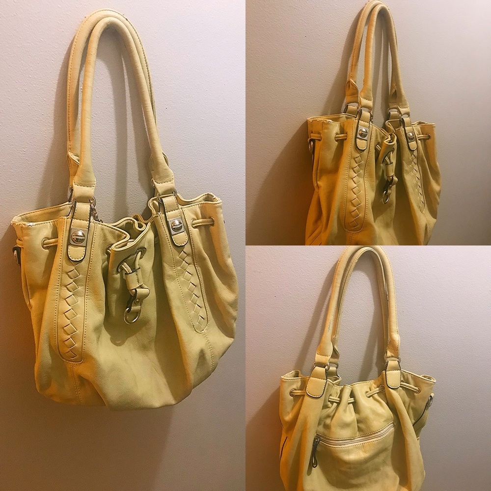 Beige and tan Michael Kors shoulder bag in the size large.